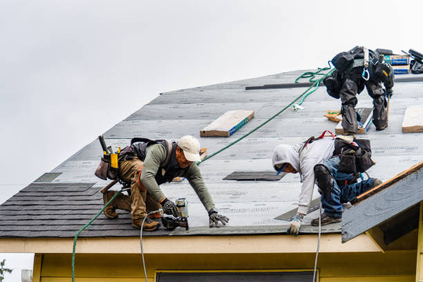 Professional Gutter Installation technician working in Easton, CA